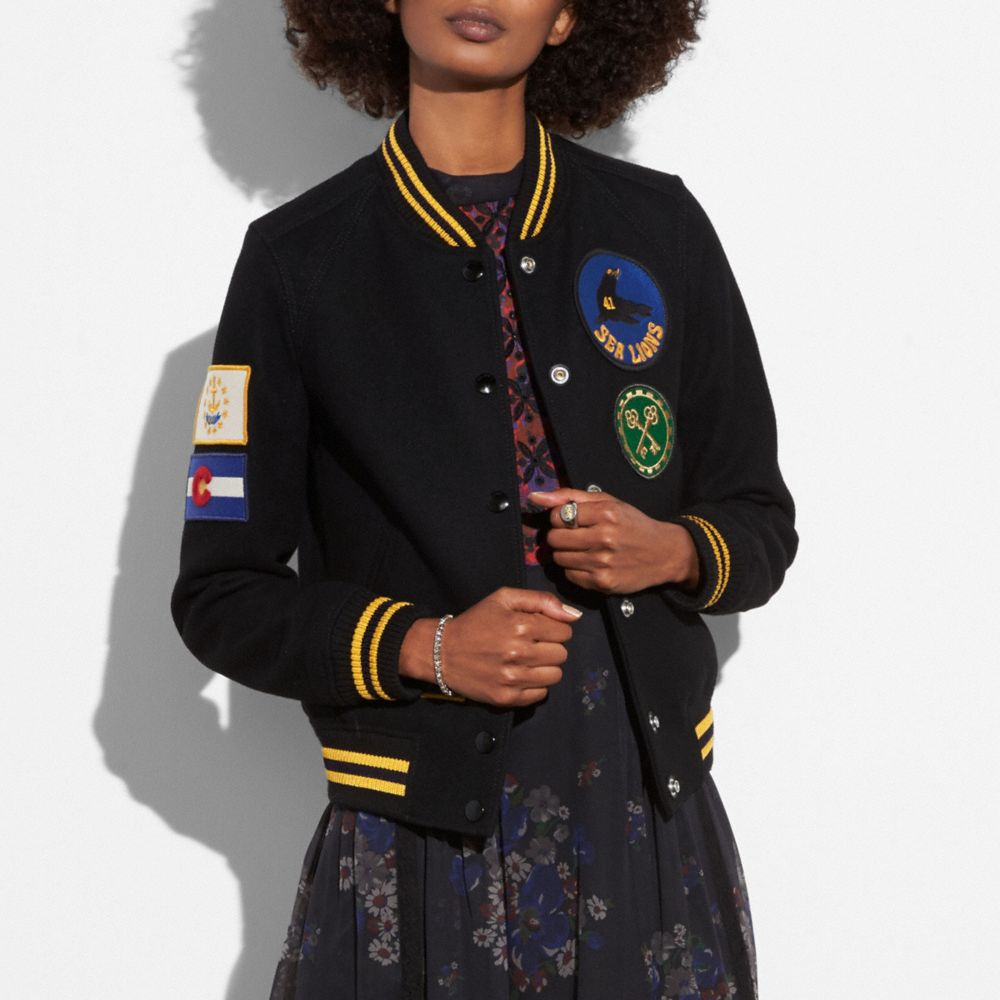 COACH®: Military Patch Varsity Jacket