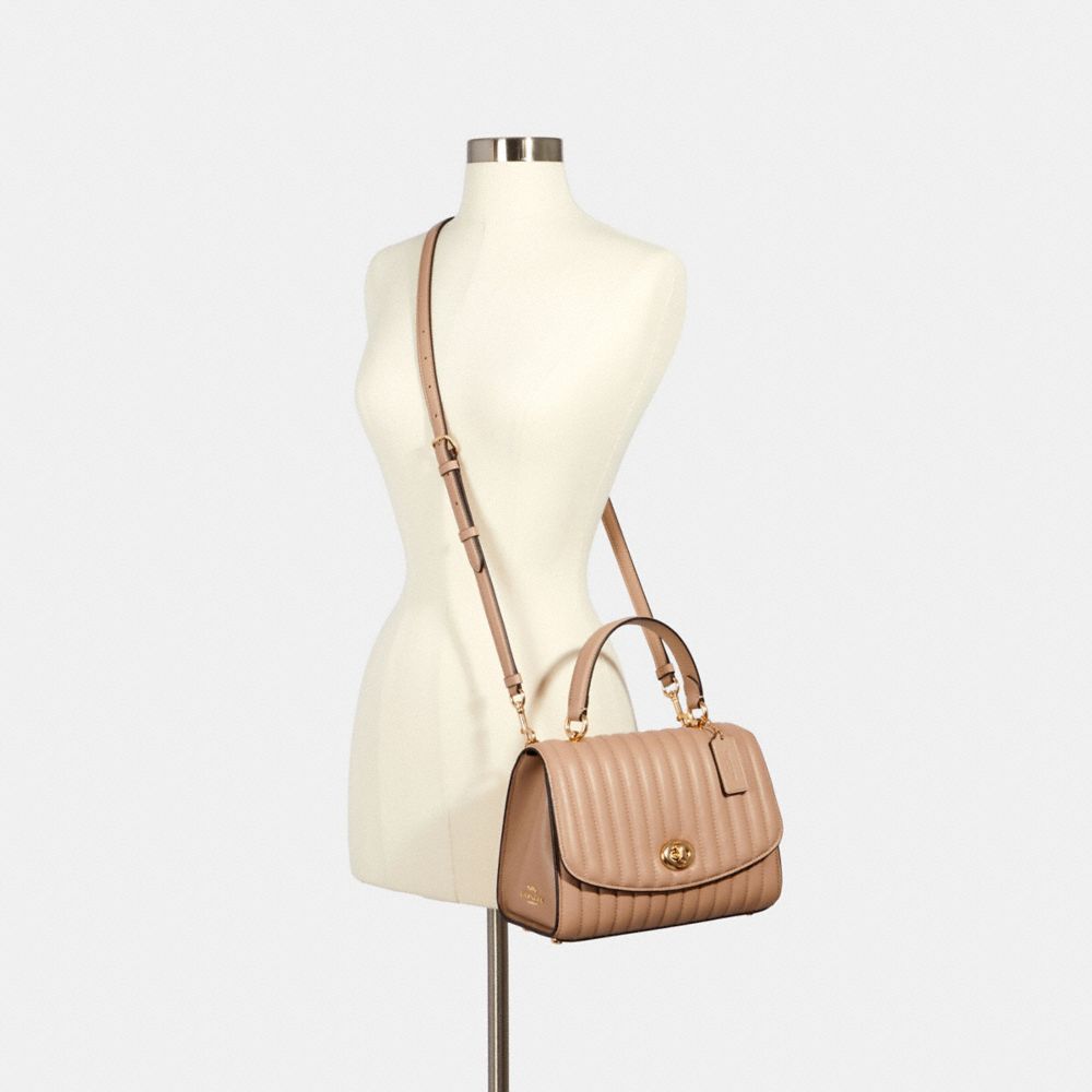 tilly top handle with linear quilting