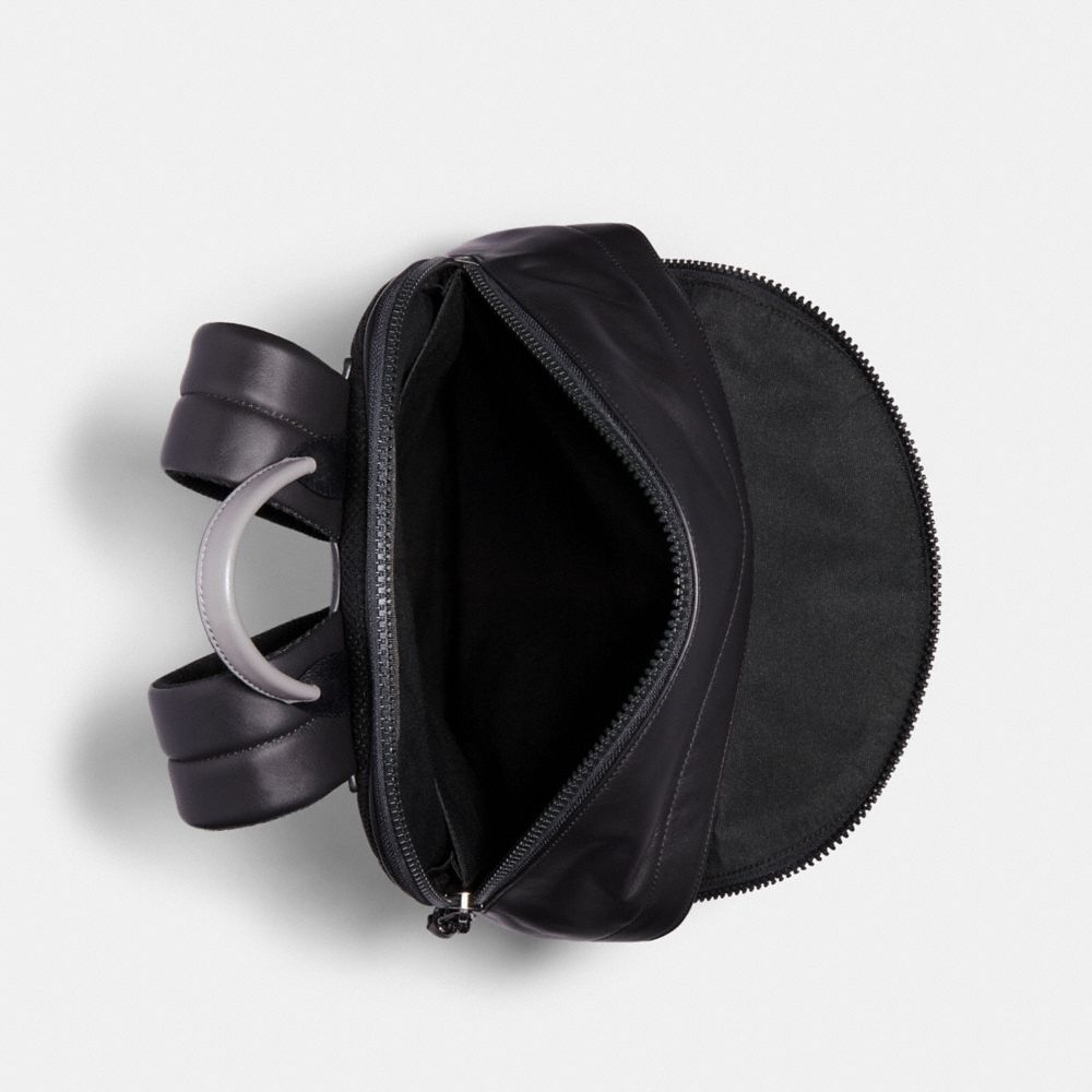 COACH® Outlet West Backpack In Signature Canvas With Rexy By Guang Yu