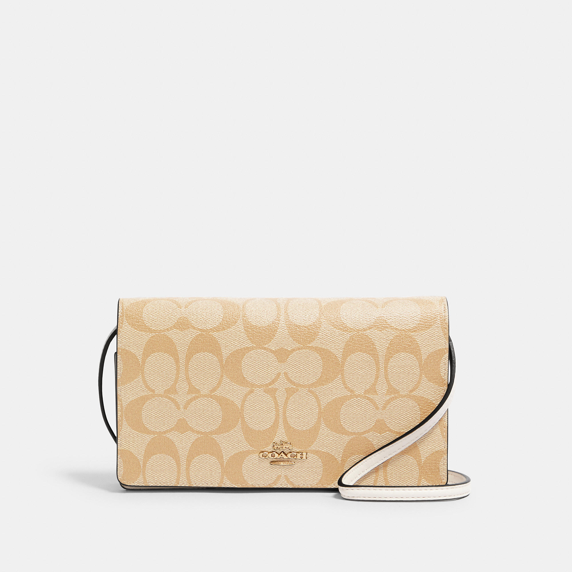 Shop Coach Outlet Anna Foldover Clutch Crossbody In Signature Canvas In Beige