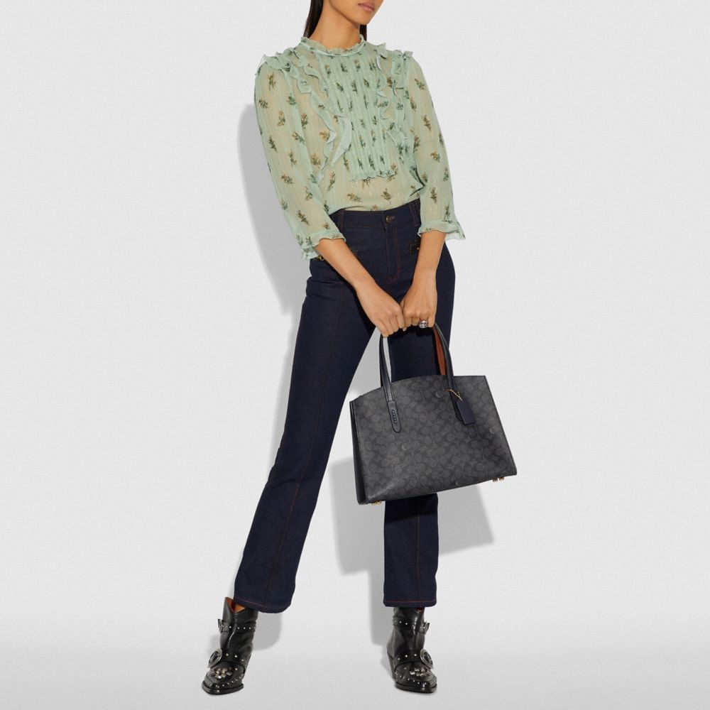 coach charlie carryall