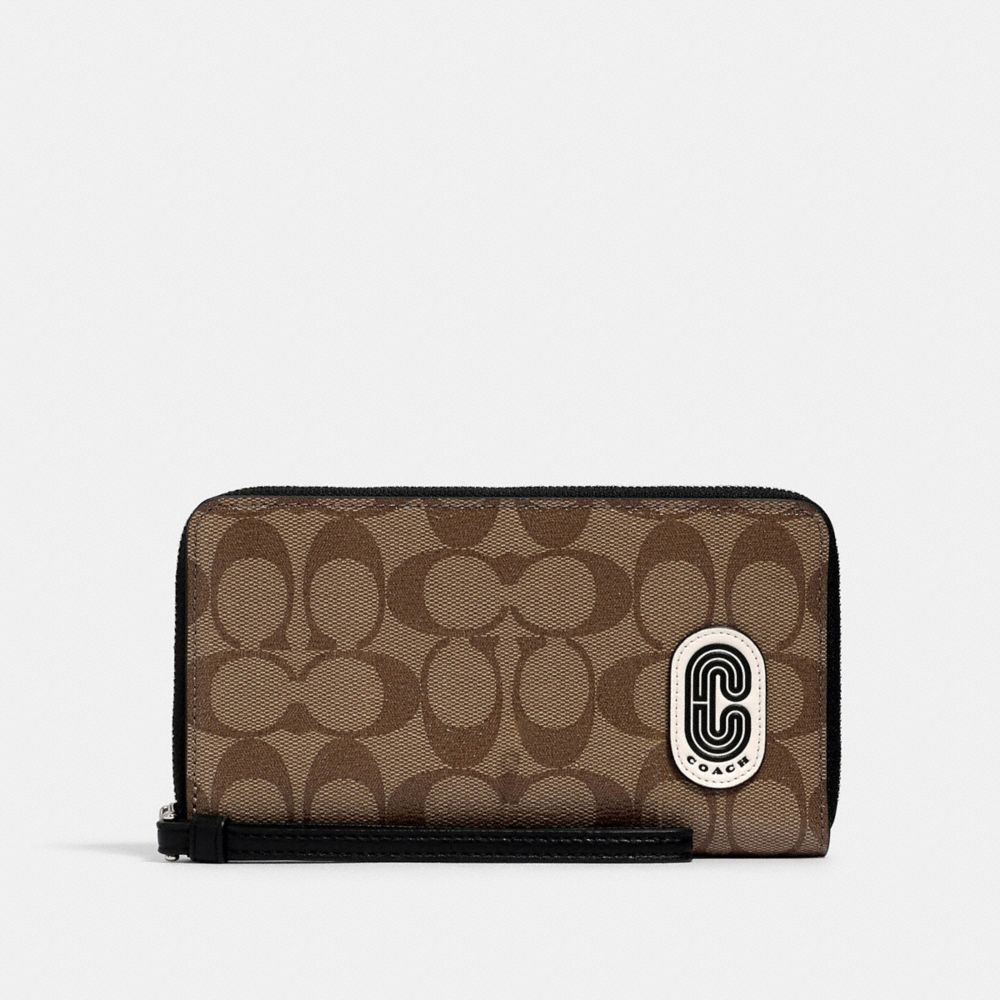 COACH® Outlet | Large Phone Wallet In Signature Canvas With Coach