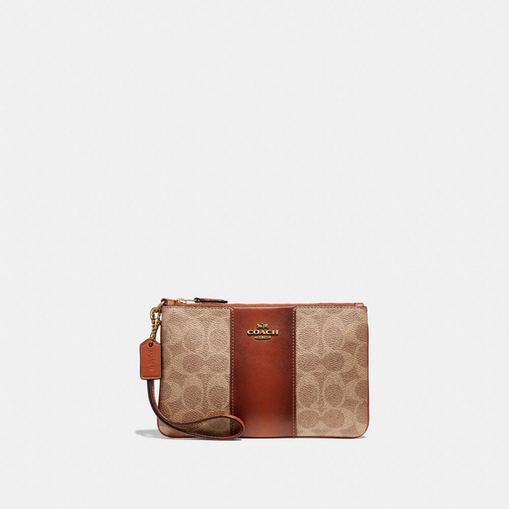 Coach Small Wristlet In Colorblock Signature Canvas In Tan/rust/brass