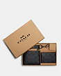 COACH®,BOXED 3-IN-1 WALLET GIFT SET IN SIGNATURE CANVAS,Mini,Black/Black/Oxblood,Front View
