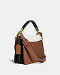 COACH®,BEAT SHOULDER BAG IN COLORBLOCK WITH RIVETS,Smooth Leather/Suede,Medium,Brass/Vintage Khaki Multi,Angle View