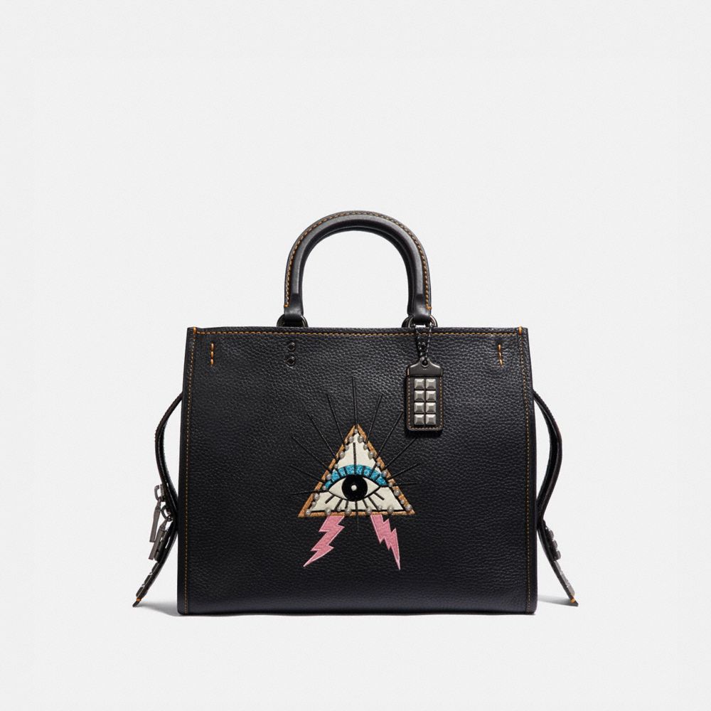 coach rogue pyramid eye