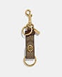 COACH®,TRIGGER SNAP BAG CHARM IN SIGNATURE CANVAS,Leather,Gold/Khaki,Front View