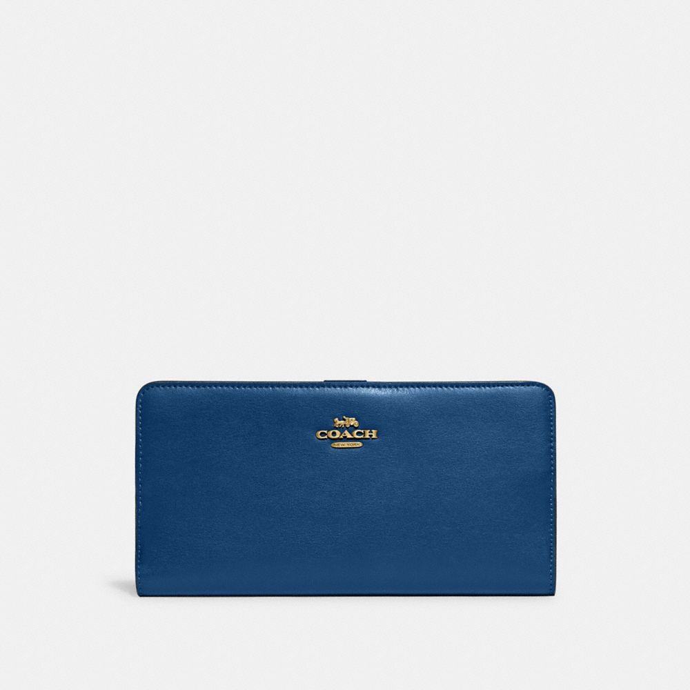 Coach In Brass/blue