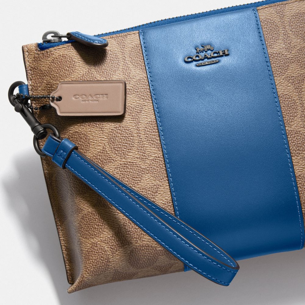 COACH® | Charlie Pouch In Colorblock Signature Canvas