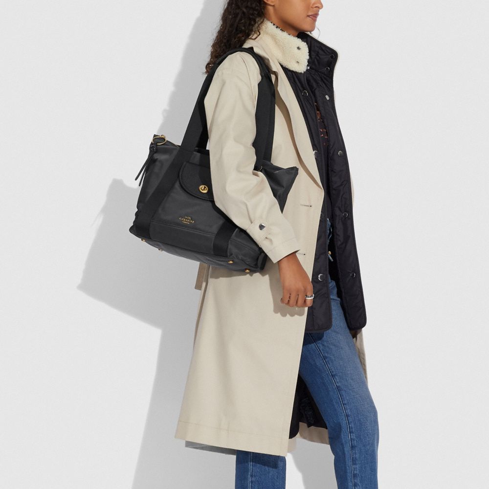 coach nylon vintage rose print interior cargo shoulder bag, significant