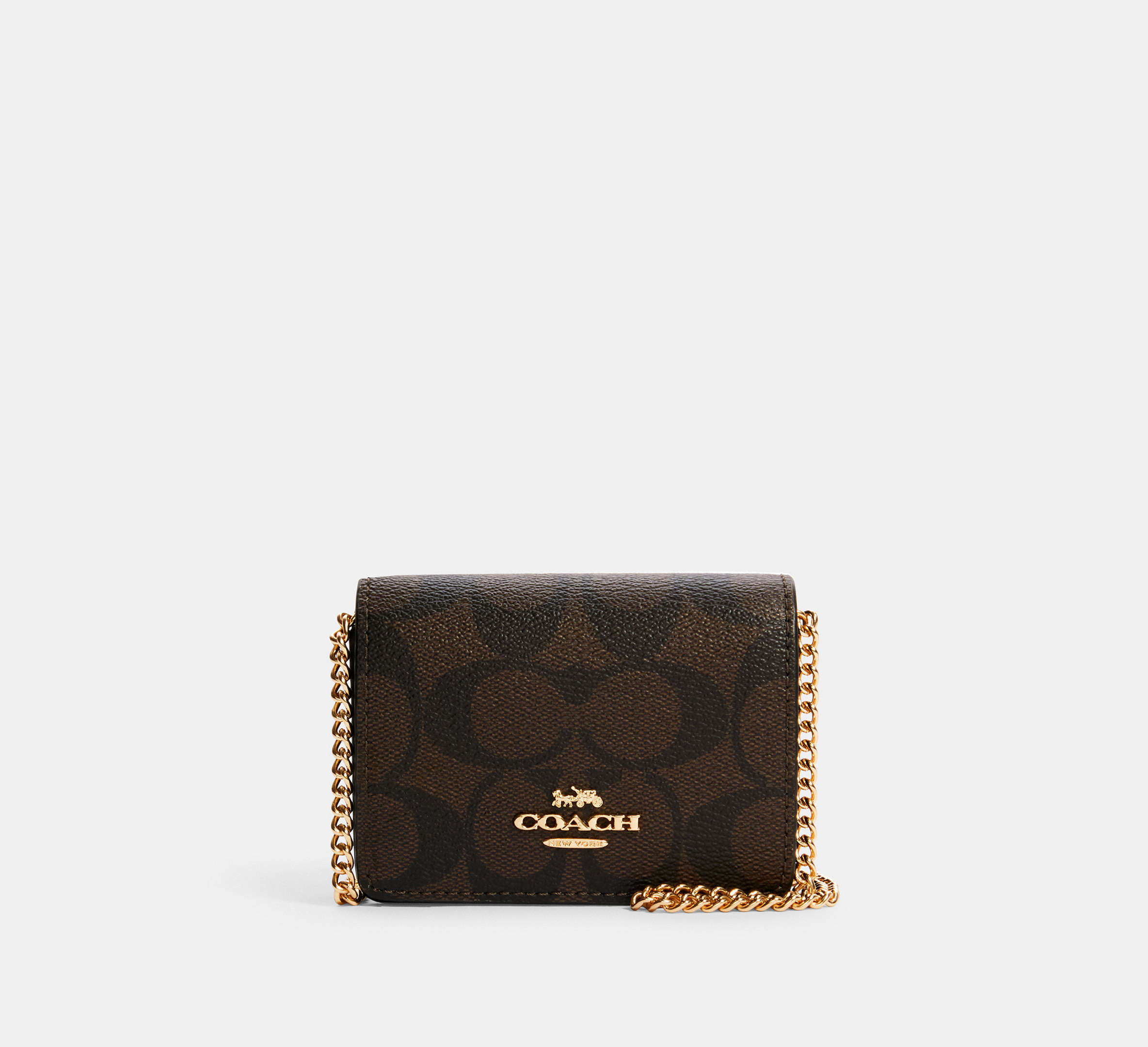 Coach: Mini Wallet On A Chain In Signature Canvas $51.20 (60% off)