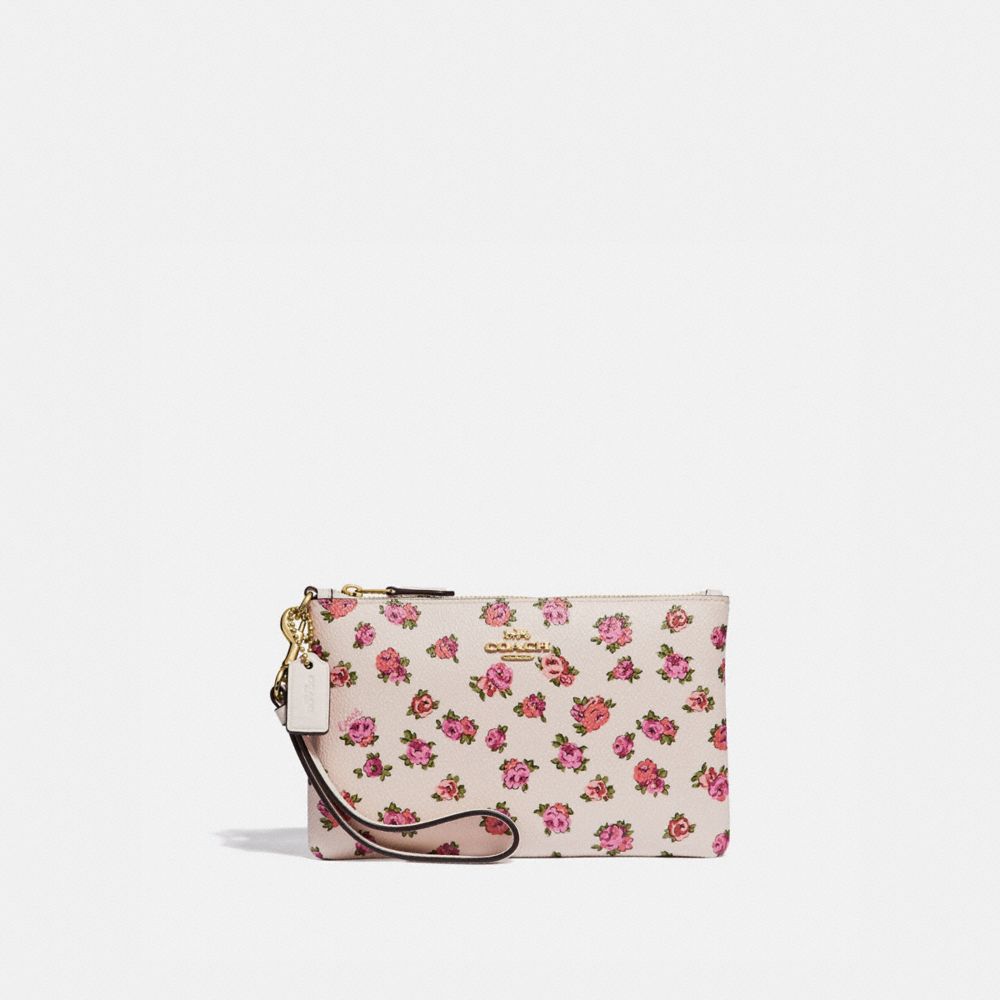 COACH Floral Bloom Wristlet in Pink