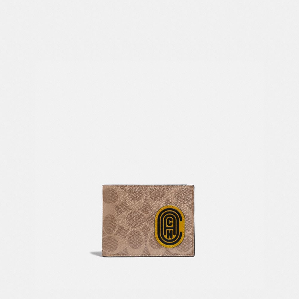 slim billfold wallet in signature canvas with coach patch