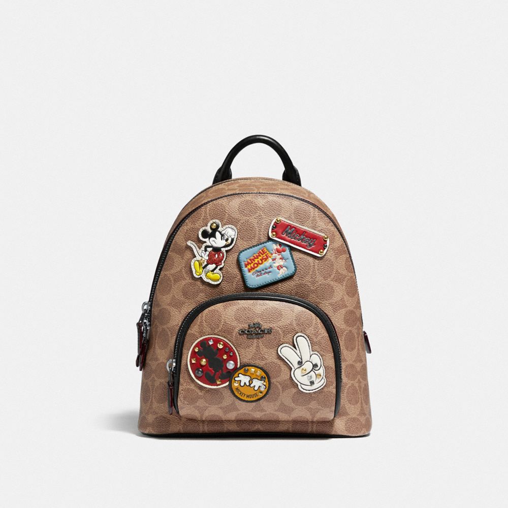 Disney X Coach Carrie Backpack 23 In Signature Canvas With Patches | COACH®