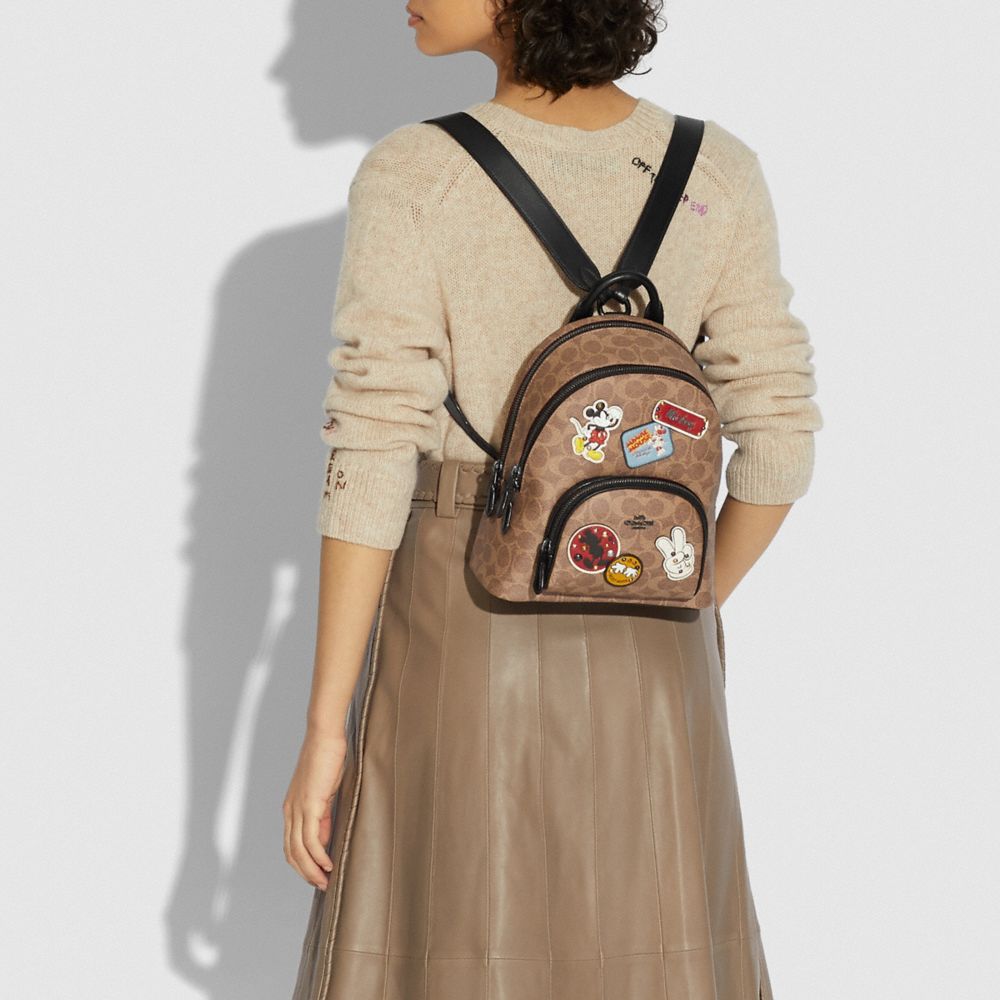 Disney X Coach Carrie Backpack 23 In Signature Canvas With Patches | COACH®