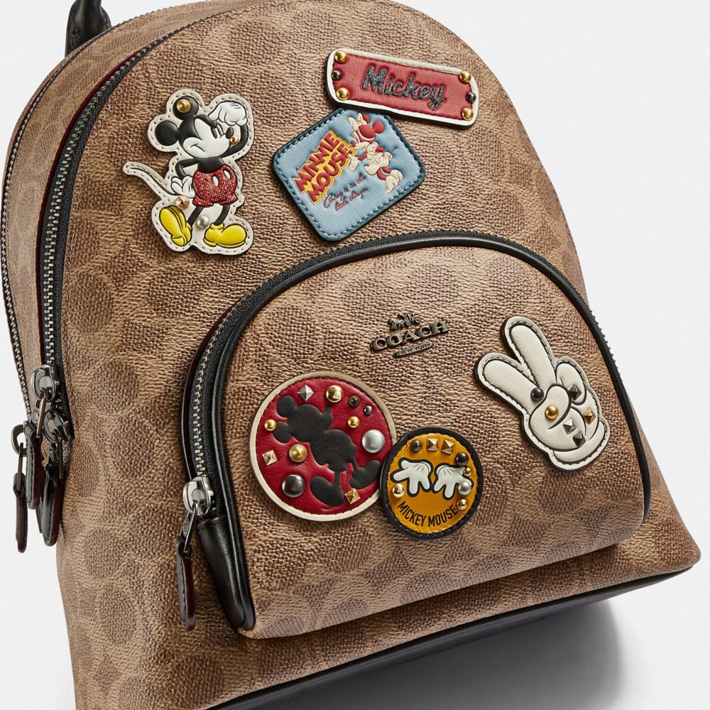 Disney X Coach Carrie Backpack 23 In Signature Canvas With Patches 