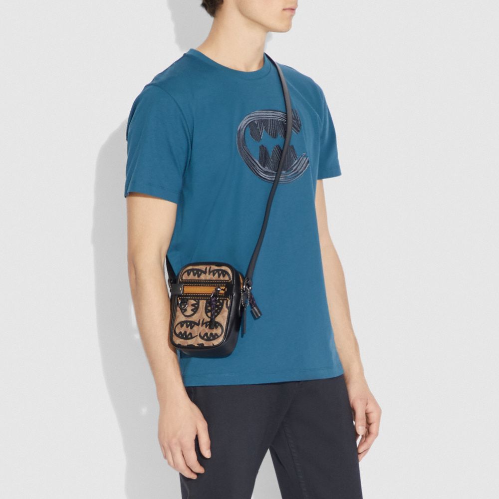 COACH® | Dylan 10 In Signature Canvas With Rexy By Guang Yu