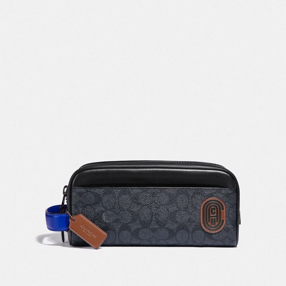 COACH® Travel Kit In Signature Canvas With Coach Patch