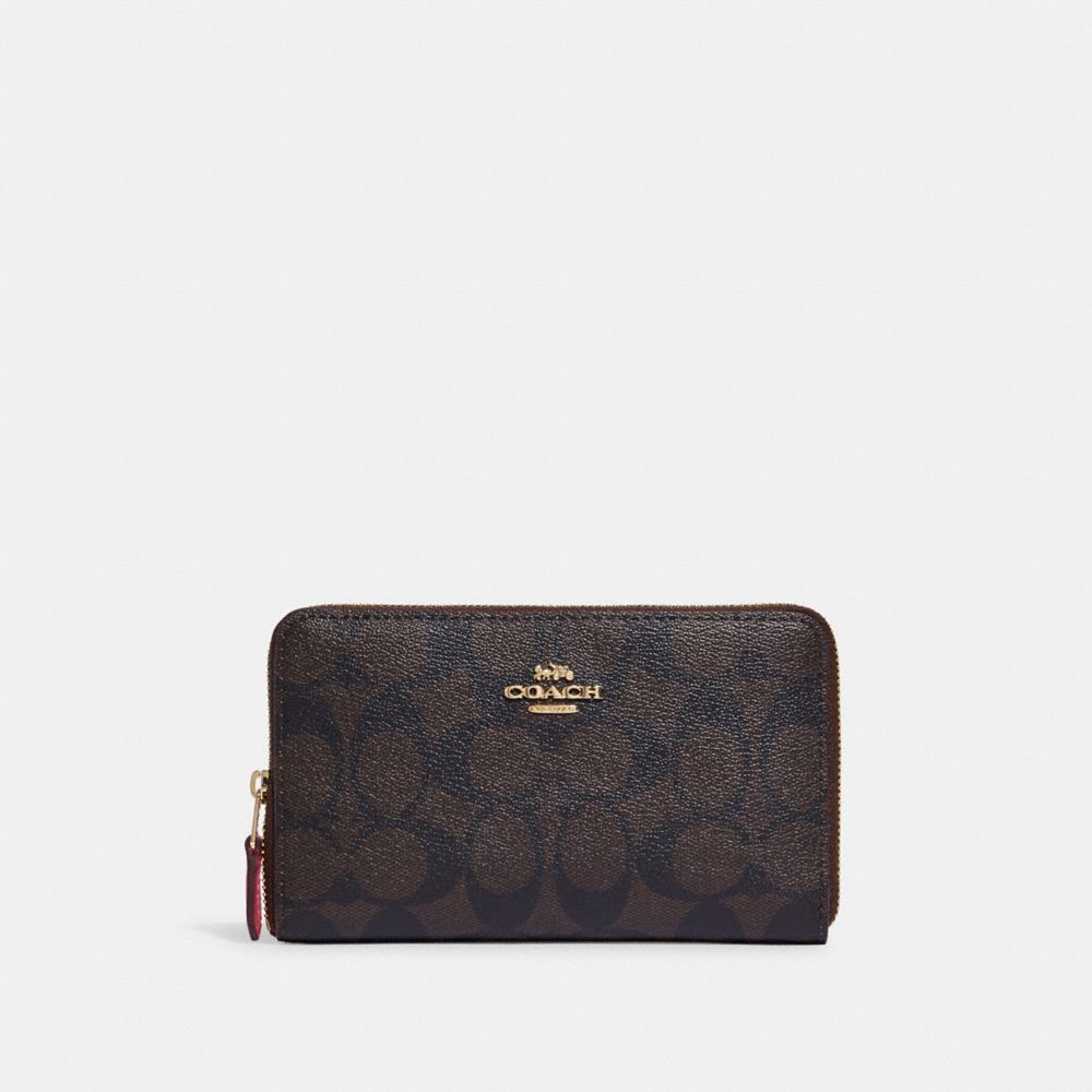 COACH® Outlet | Medium Id Zip Wallet In Signature Canvas