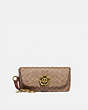 COACH®,SUNGLASS CASE BAG CHARM IN SIGNATURE CANVAS,Leather,Brass/Tan/Rust,Front View