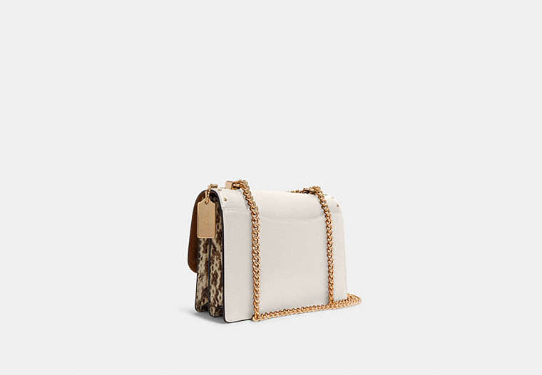 Klare Crossbody In Signature Canvas With Rivets