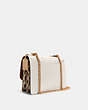 Klare Crossbody In Signature Canvas With Rivets