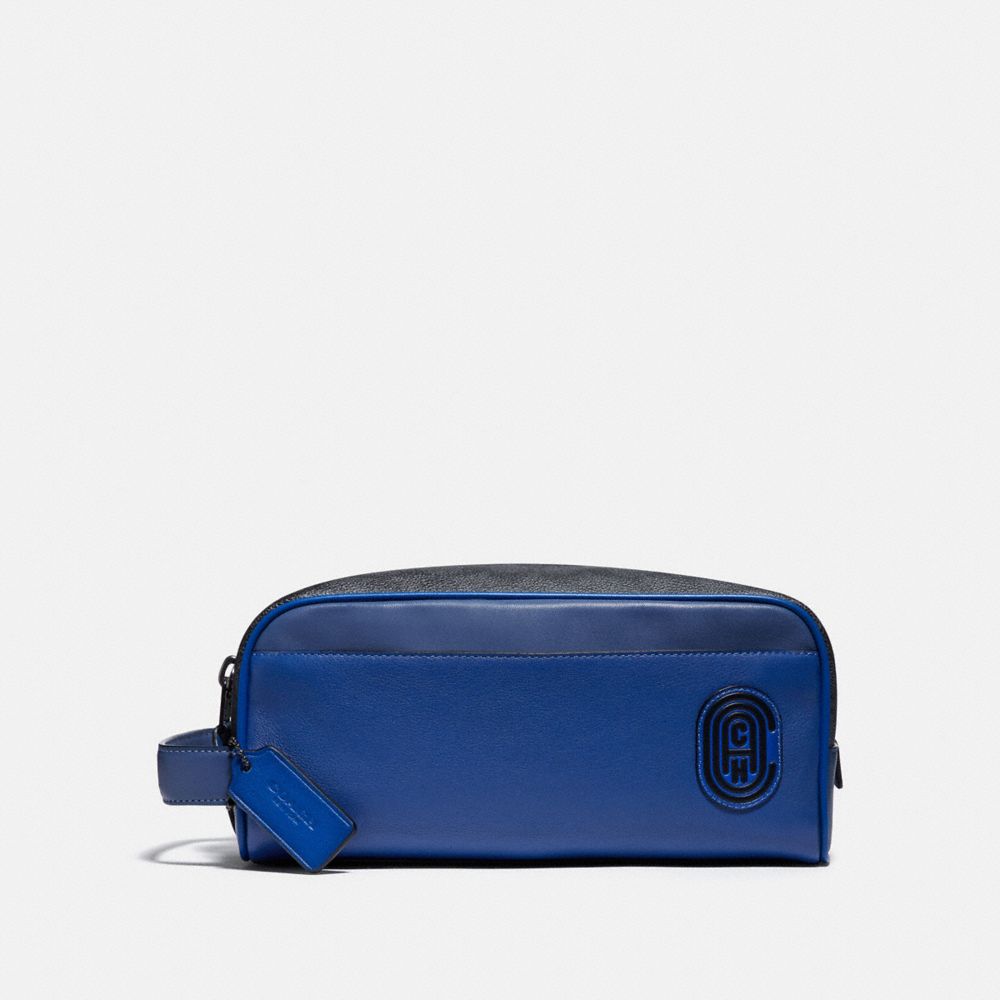 COACH® Travel Kit In Signature Canvas With Coach Patch