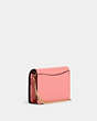COACH®,MINI WALLET ON A CHAIN,Leather,Mini,Gold/Candy Pink,Angle View
