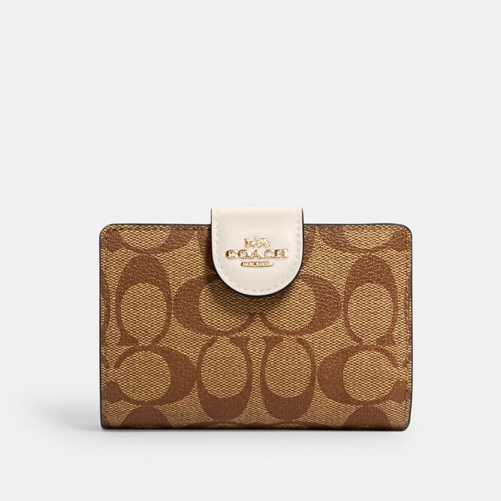 COACH OUTLET® | Medium Corner Zip Wallet In Signature Canvas