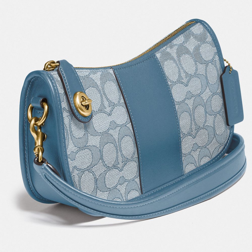 COACH Swinger Bag In Signature Jacquard in Blue