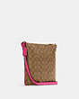 COACH®,ROWAN FILE BAG IN SIGNATURE CANVAS,pvc,Small,Everyday,Gold/Khaki/Bold Pink,Angle View