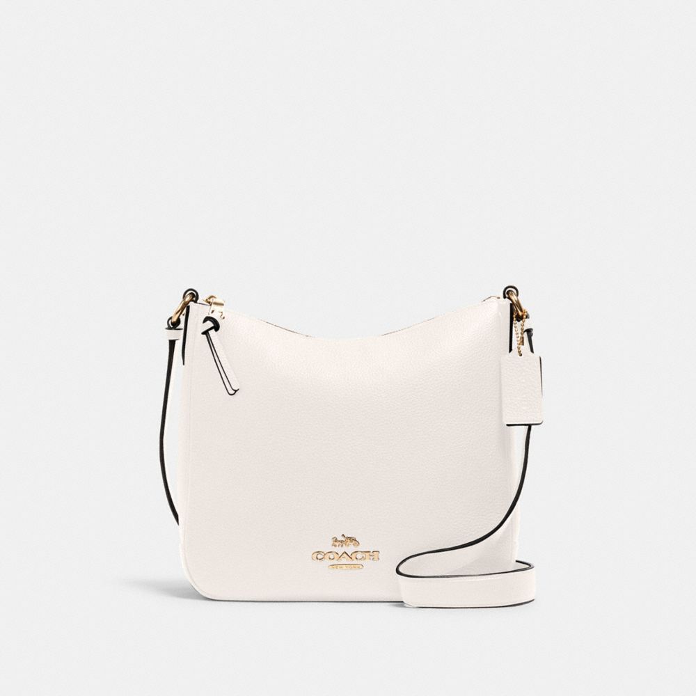 Arriba 120+ imagen white coach crossbody purse