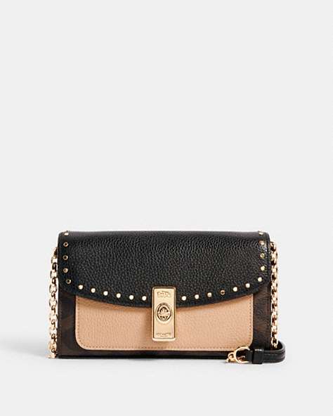 Lane Crossbody In Signature Canvas With Rivets
