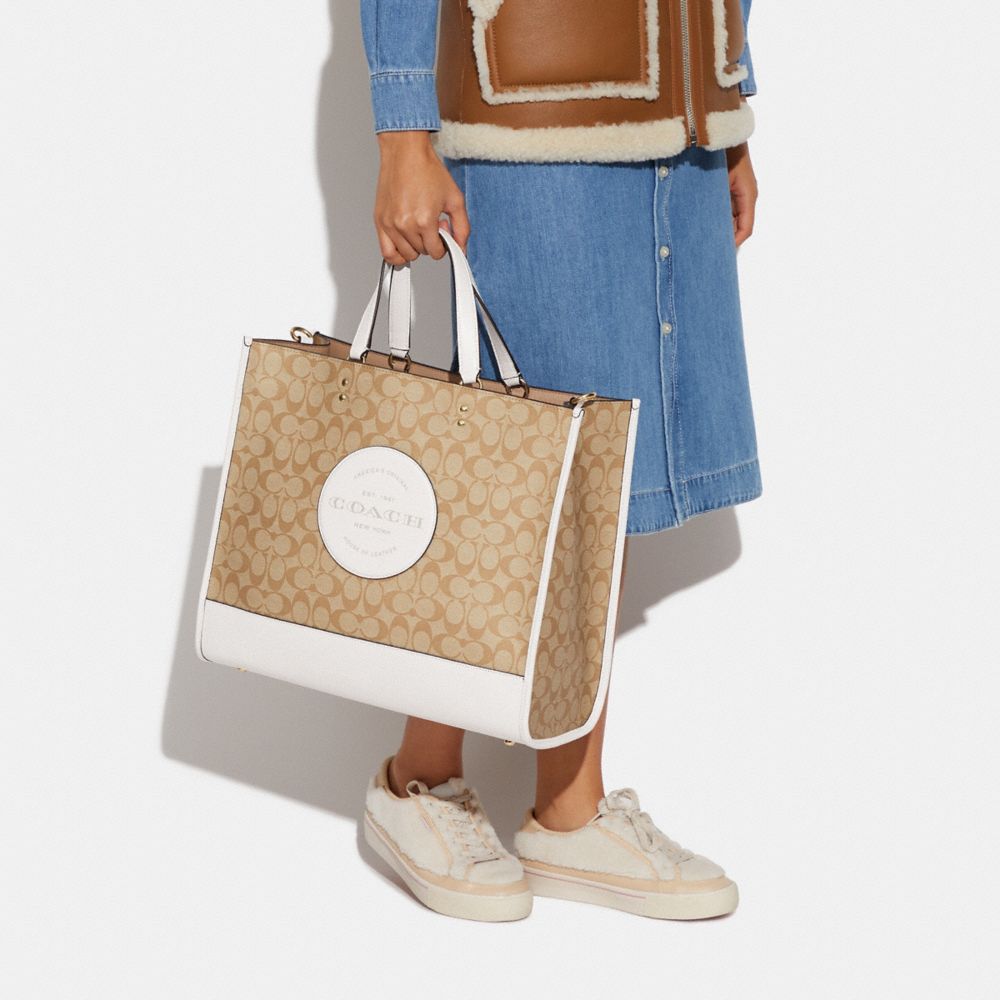 COACH® Outlet | Dempsey Tote 40 In Signature Canvas With Coach Patch