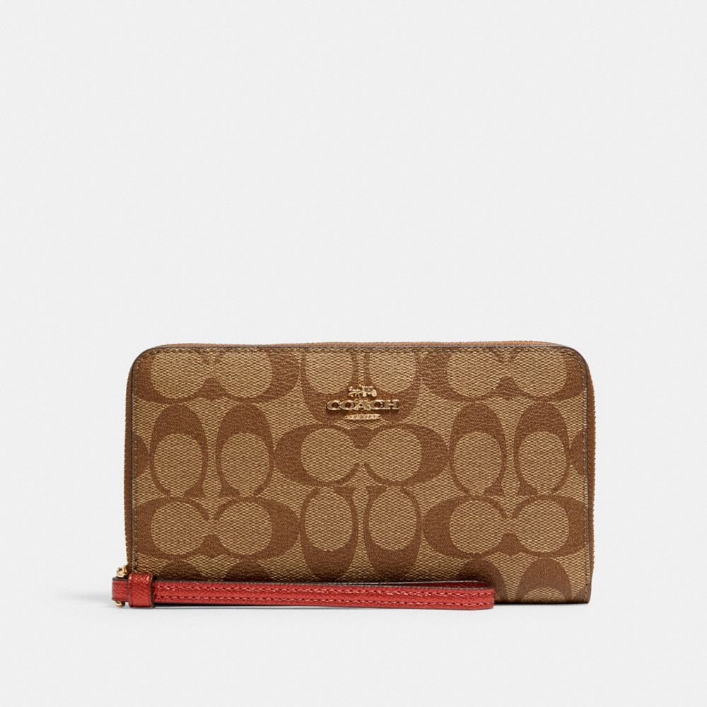 COACH® Outlet Large Phone Wallet In Signature Canvas
