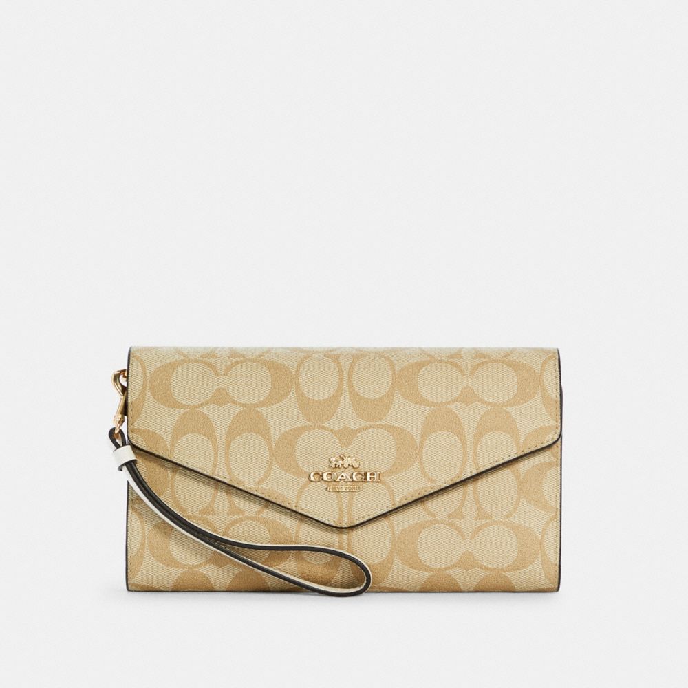 COACH® Outlet Travel Envelope Wallet In Signature Canvas