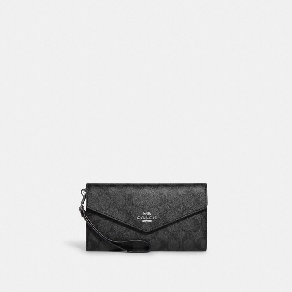 COACH® Outlet Travel Envelope Wallet In Signature Canvas