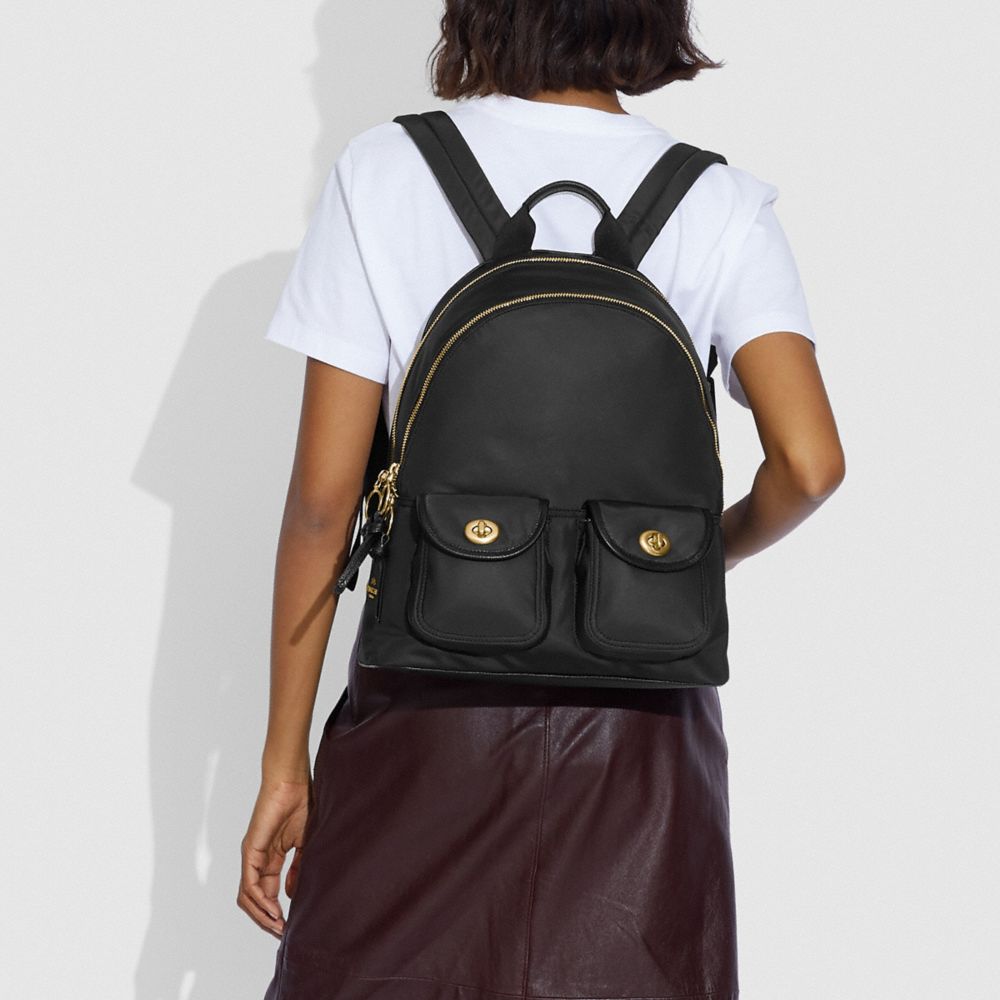 COACH® | Cargo Carrie Backpack With Vintage Rose Print Interior