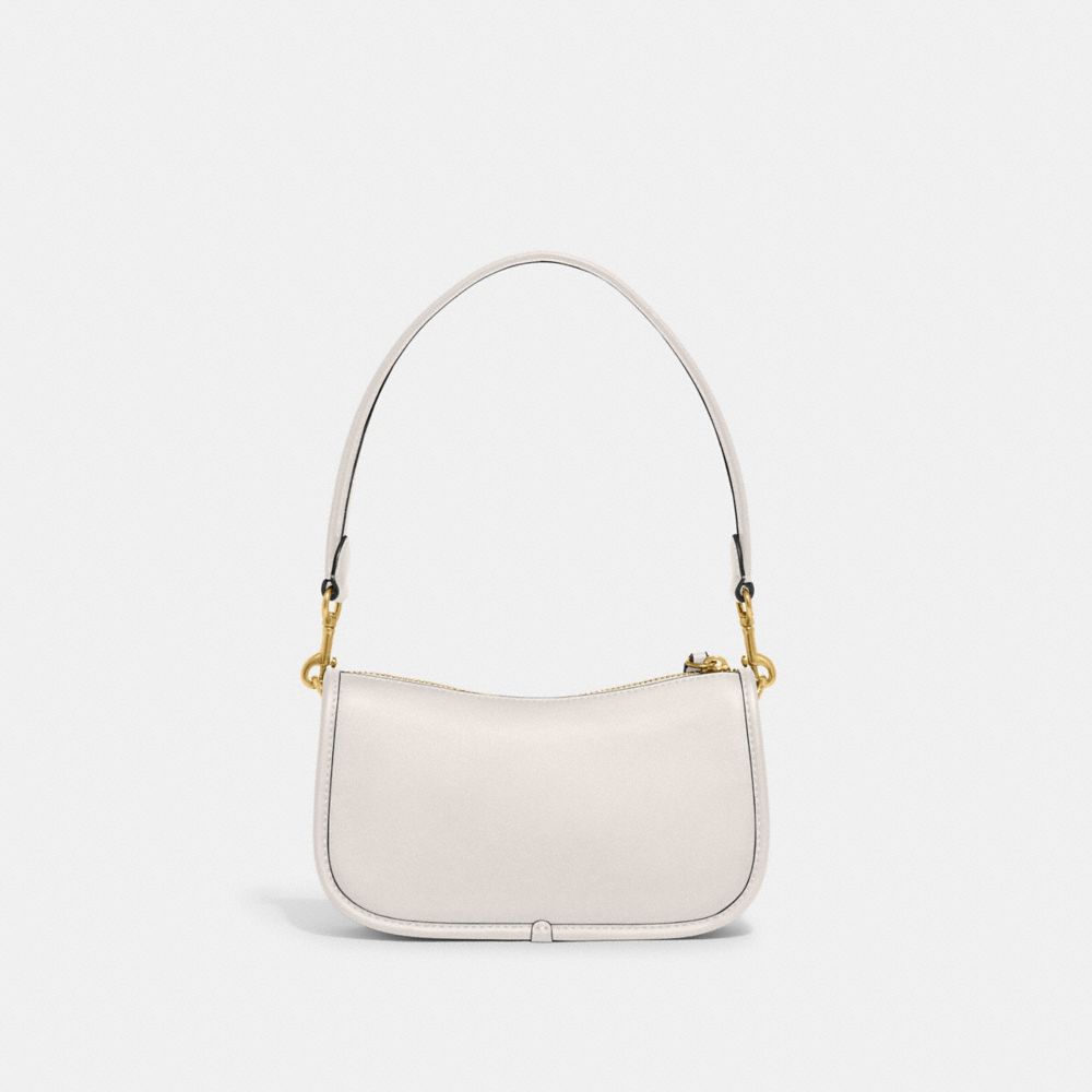 Shop Coach Swinger 20 In Brass/chalk