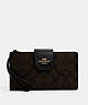 COACH®,PHONE WALLET IN COLORBLOCK SIGNATURE CANVAS,pvc,Gold/Brown Black,Front View