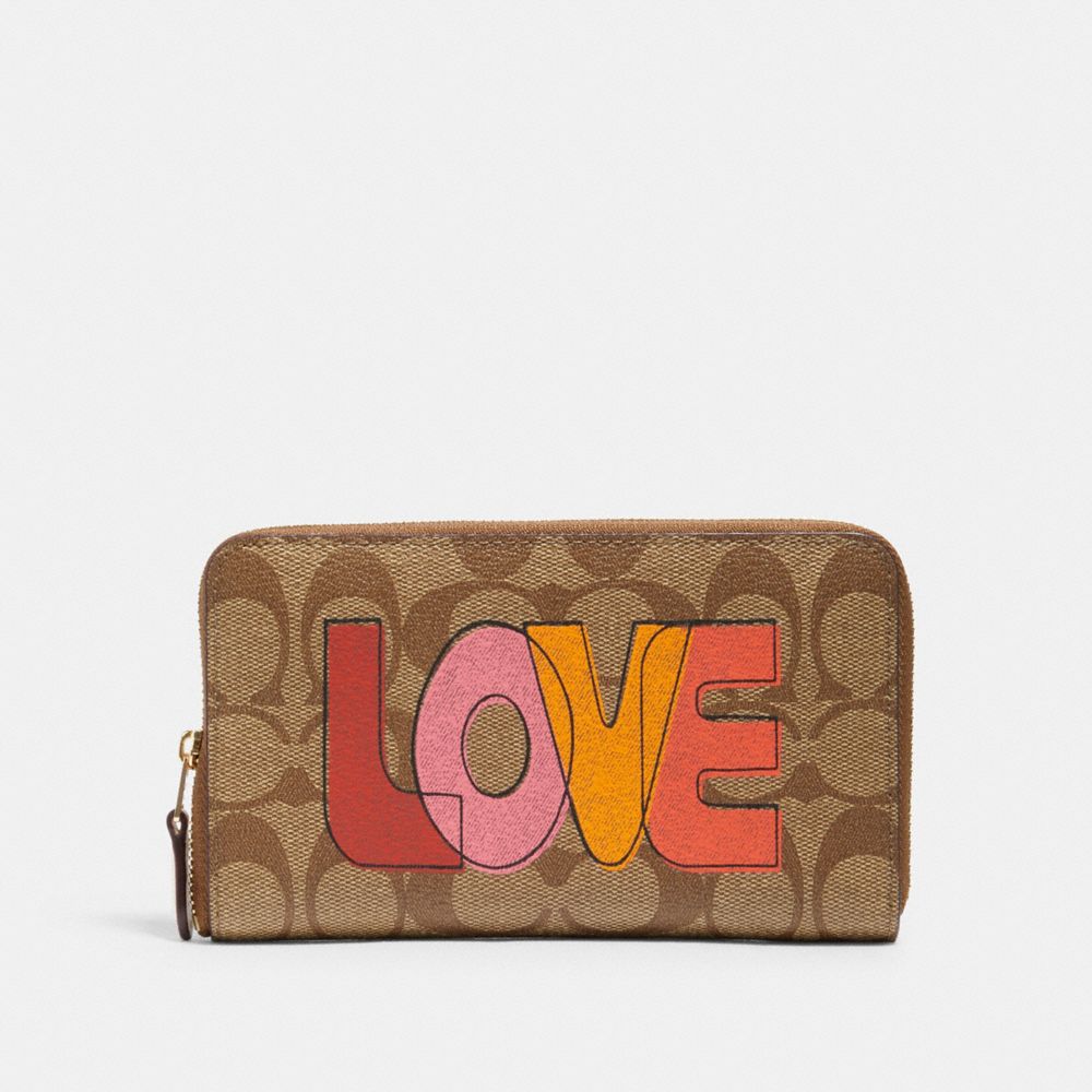 COACH® Outlet Medium Id Zip Wallet In Signature Canvas With Love Print