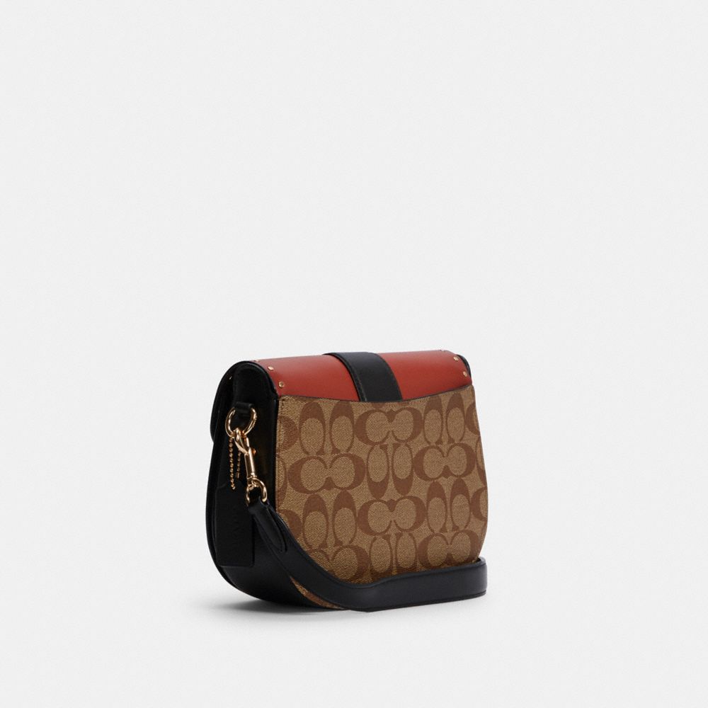 COACH Saddle Bag In Colorblock Signature Canvas With Rivets