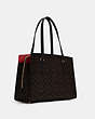 COACH®,TATUM CARRYALL 40 IN SIGNATURE CANVAS,n/a,Large,Gold/Brown Black,Angle View