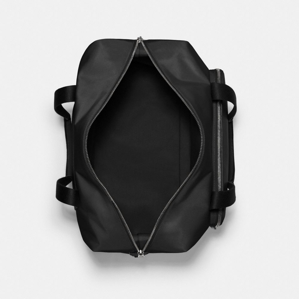 Introducir 112+ imagen coach outlet weekender bag Abzlocal.mx