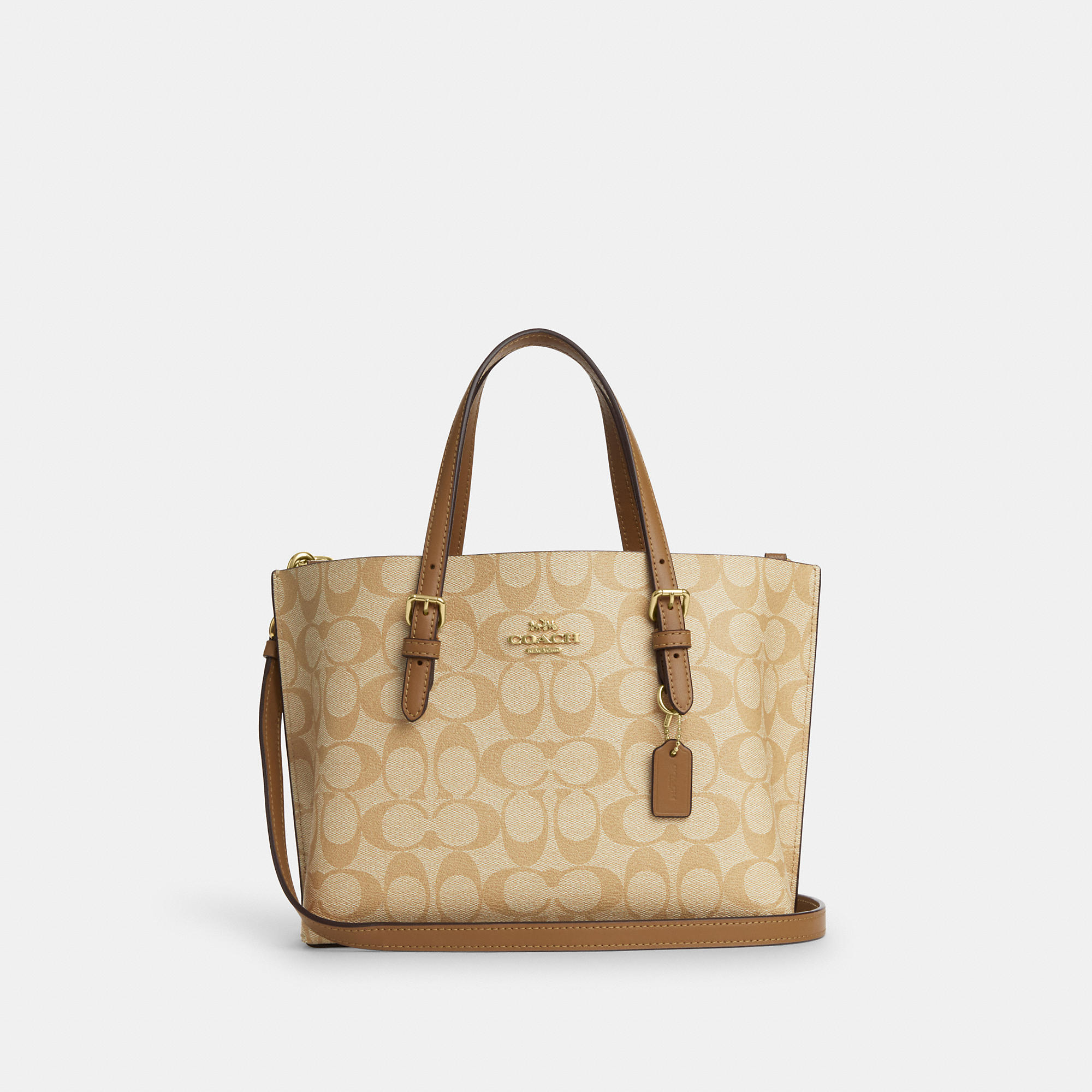 Coach Outlet Mollie Tote 25 In Signature Canvas In Gold/lt Khaki/lt Saddle