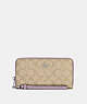 COACH®,LONG ZIP AROUND WALLET IN SIGNATURE CANVAS,pvc,Mini,Silver/Light Khaki/Soft Lilac,Front View