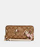 Long Zip Around Wallet In Signature Canvas With Evergreen Floral Print