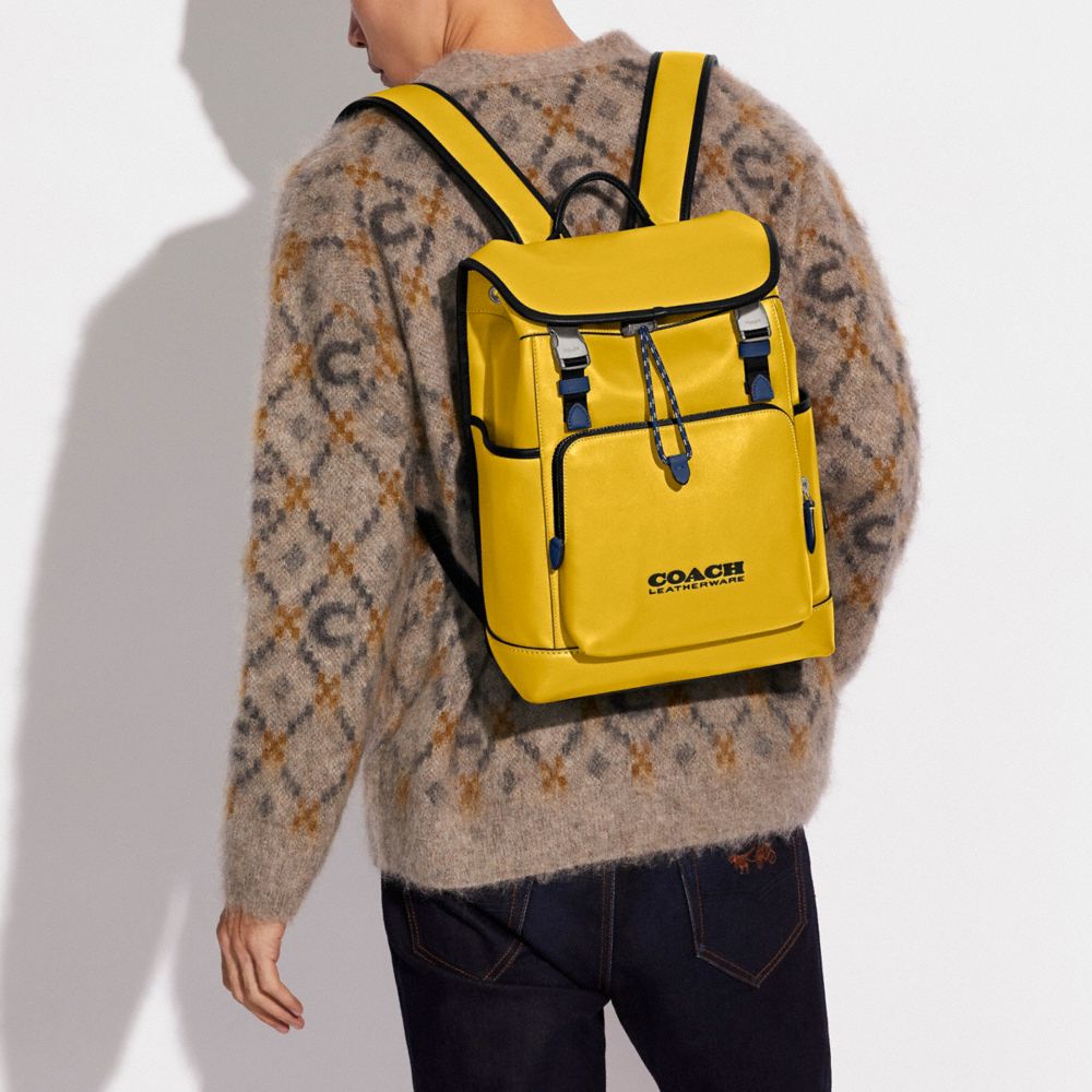 美品》コーチ リーグ フラップ バックパック カラーブロック イエロー-