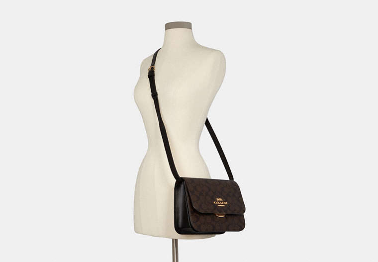 Brynn Flap Crossbody In Signature Canvas Brynn Flap Crossbody In Signature Canvas