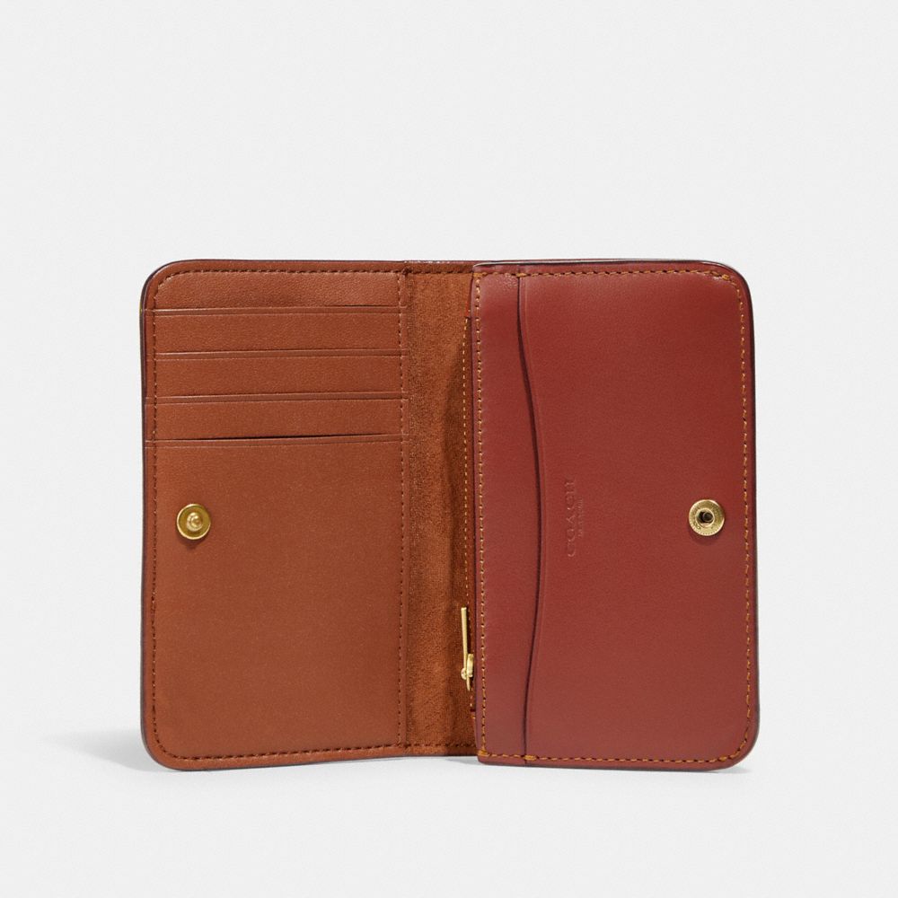 COACH®: Slim Card Case In Signature Canvas